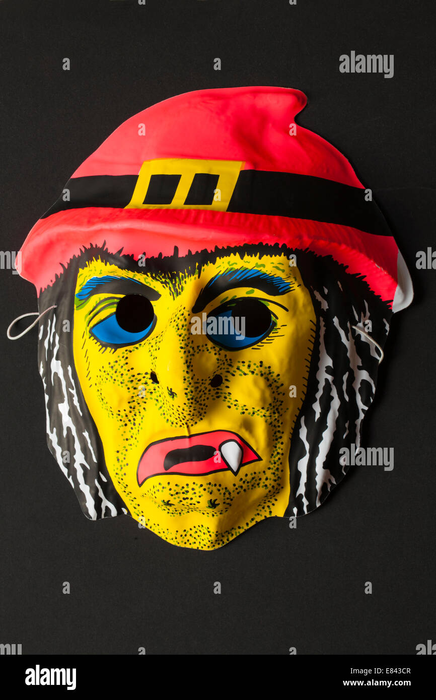 Scary halloween mask isolated on black background Stock Photo - Alamy