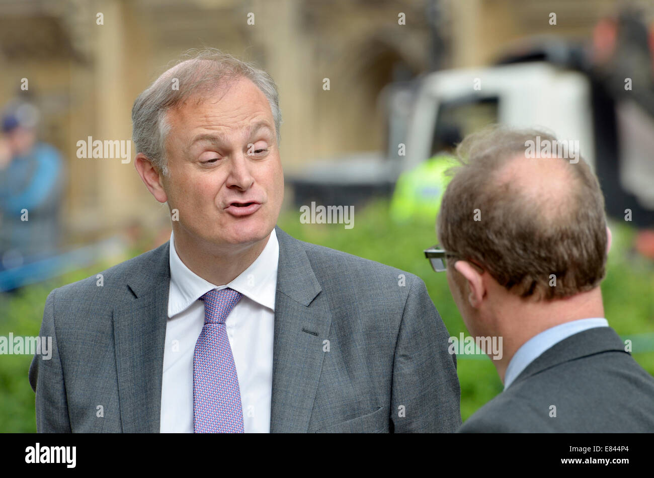 Stewart Jackson MP (Conservative, Peterborough) being interviewed on College Green, Westminster, opposite Parliament Stock Photo