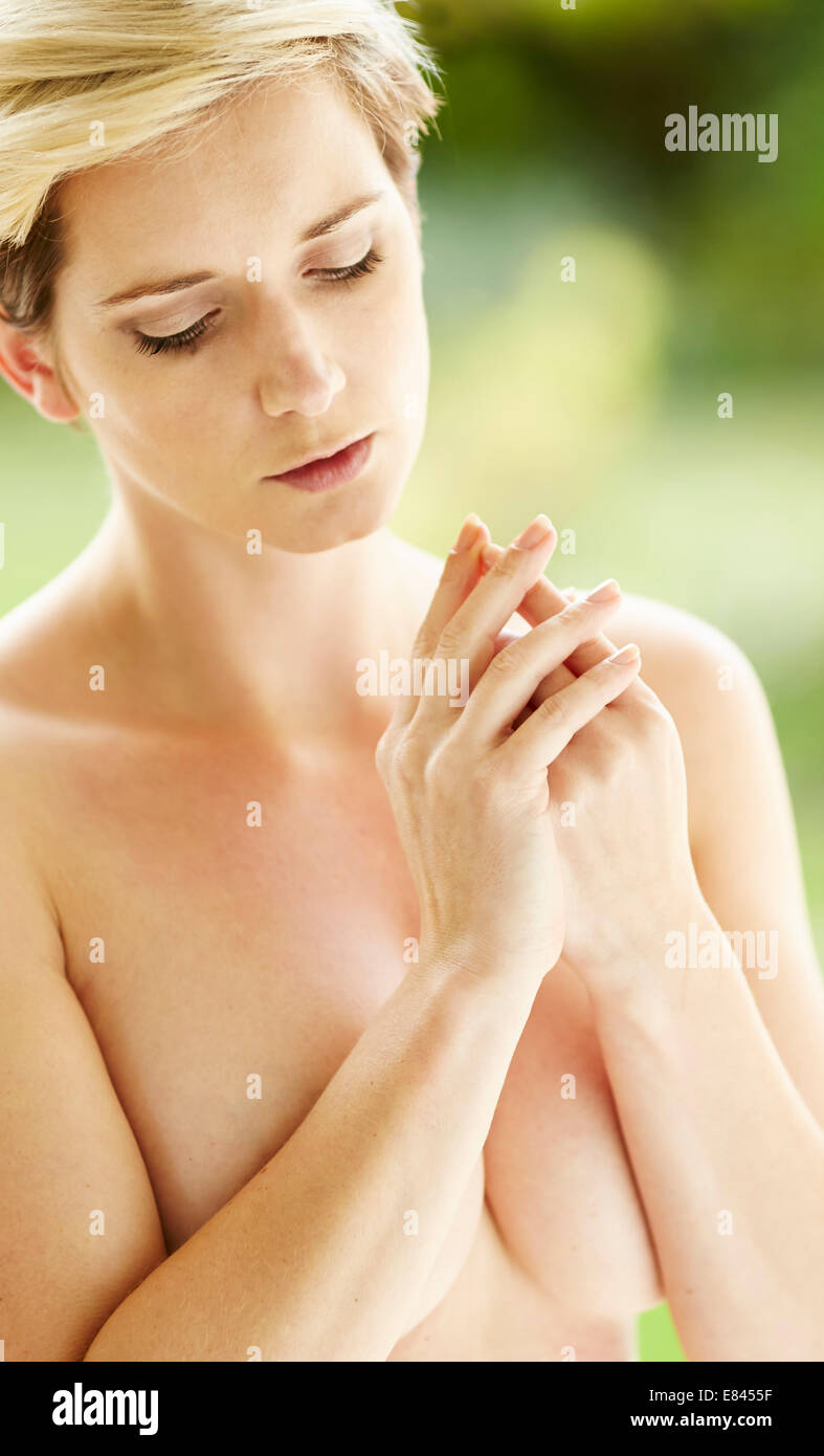 Woman massaging hands Stock Photo