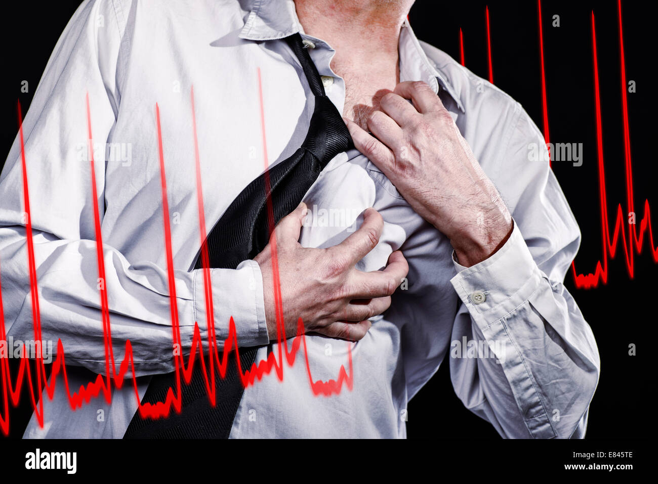 Man thumbs up with a cramped hand to his heart area and rips off his shirt. The curve of an ECG is shown. Stock Photo