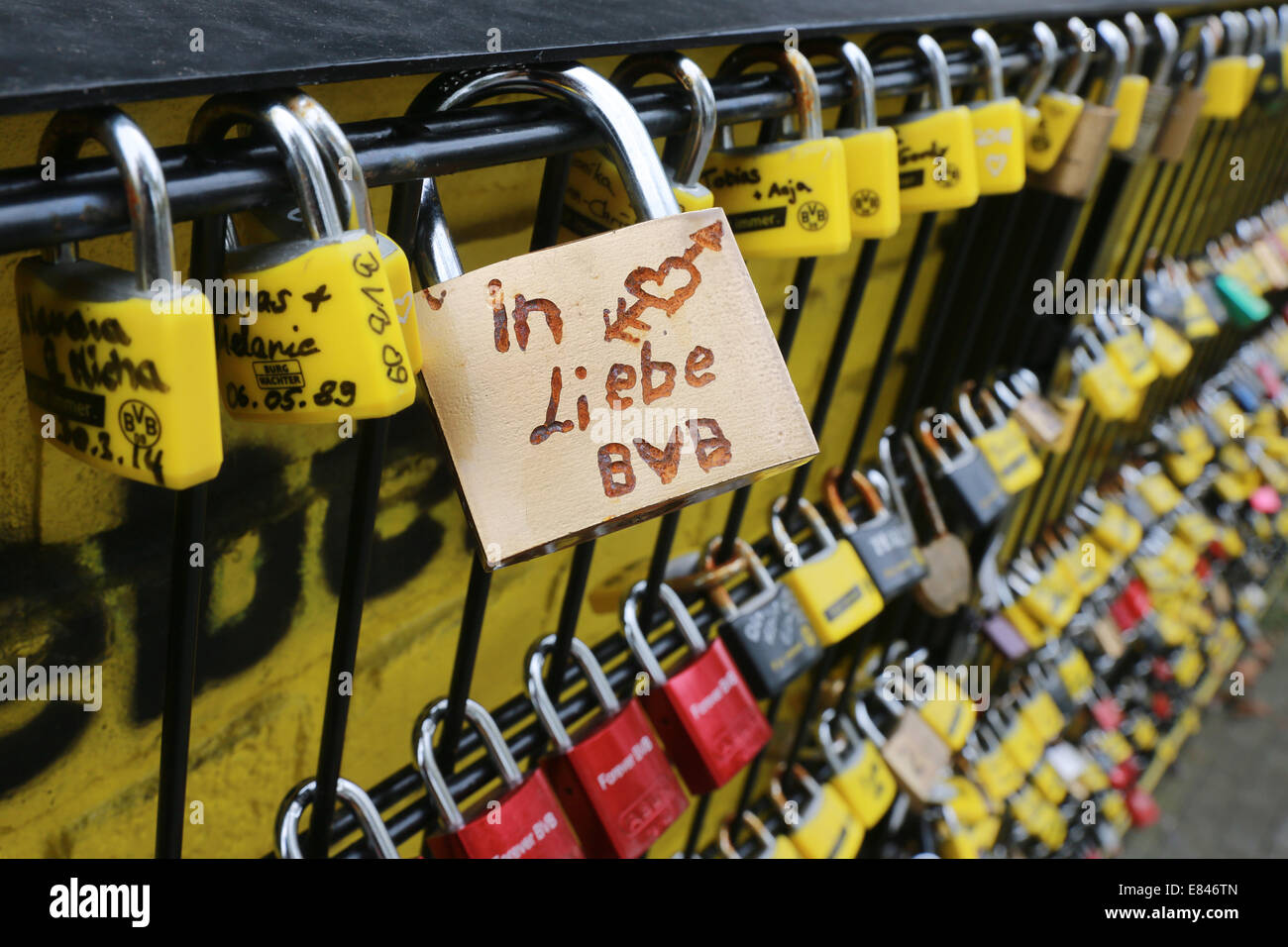 - Love padlock on a fence at the stadium of the german soccer club BVB Borussia Dortmund says 'in love BVB'. Dortmund, Germany Stock Photo