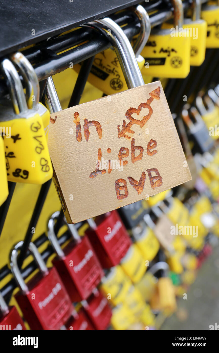 - Love padlock on a fence at the stadium of the german soccer club BVB Borussia Dortmund says 'in love BVB'. Dortmund, Germany Stock Photo