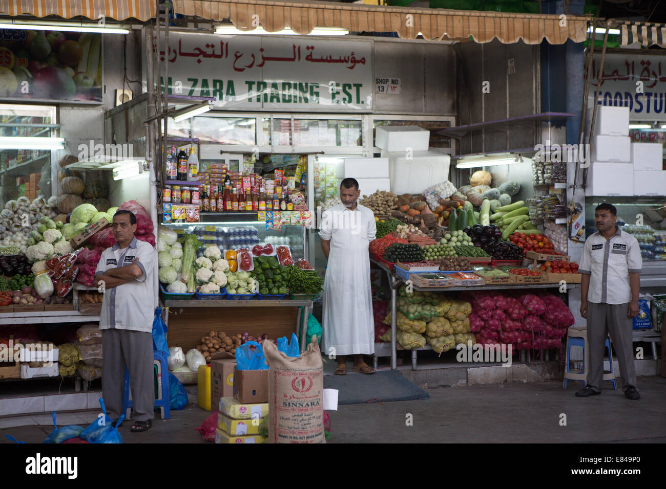 Staff wait for customers in the Deira Fruit and Vegetable Market, Dubai