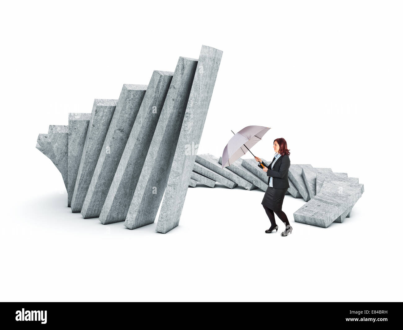 falling walls and woman with umbrella Stock Photo