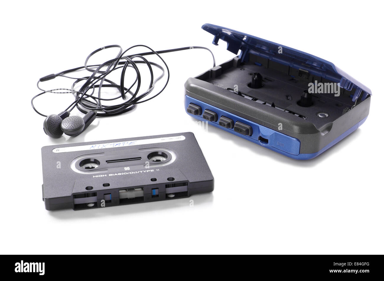 old-fashioned music cassette and walkman with earphones Stock Photo