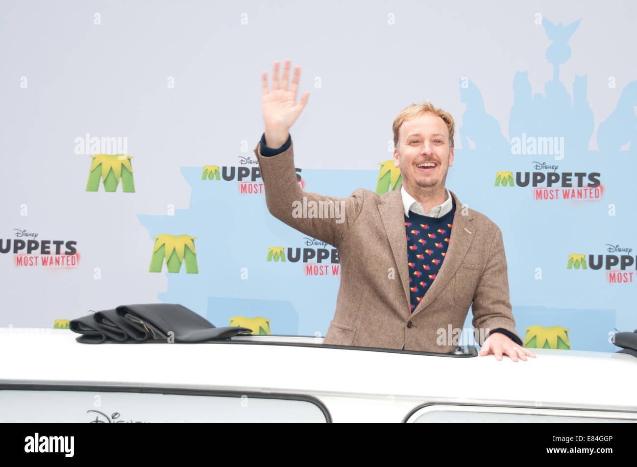 James Bobin, Miss Piggy and Kermit coming in XXL Trabant to promote the new 'The Muppets Most Wanted' Movie at Sony Center  Featuring: James Bobin Where: Berlin, Germany When: 28 Mar 2014 Stock Photo
