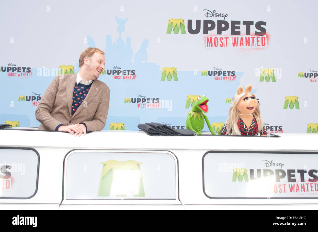 James Bobin, Miss Piggy and Kermit coming in XXL Trabant to promote the new 'The Muppets Most Wanted' Movie at Sony Center  Featuring: James Bobin,Miss Piggy,Kermit Where: Berlin, Germany When: 28 Mar 2014 Stock Photo