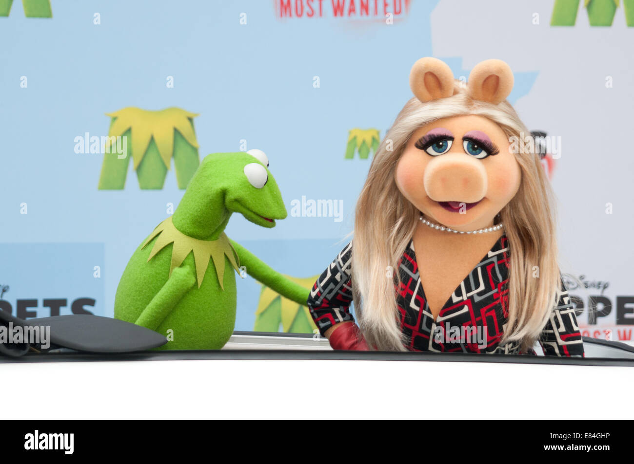James Bobin, Miss Piggy and Kermit coming in XXL Trabant to promote the new 'The Muppets Most Wanted' Movie at Sony Center  Featuring: Kermit,Miss Piggy Where: Berlin, Germany When: 28 Mar 2014 Stock Photo