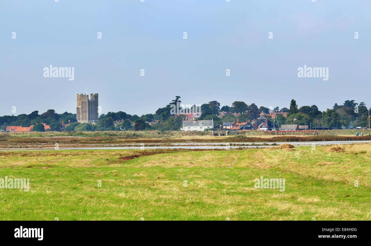 English Coastal Village of Orford in East Anglia, England viewed from across the estuary Stock Photo