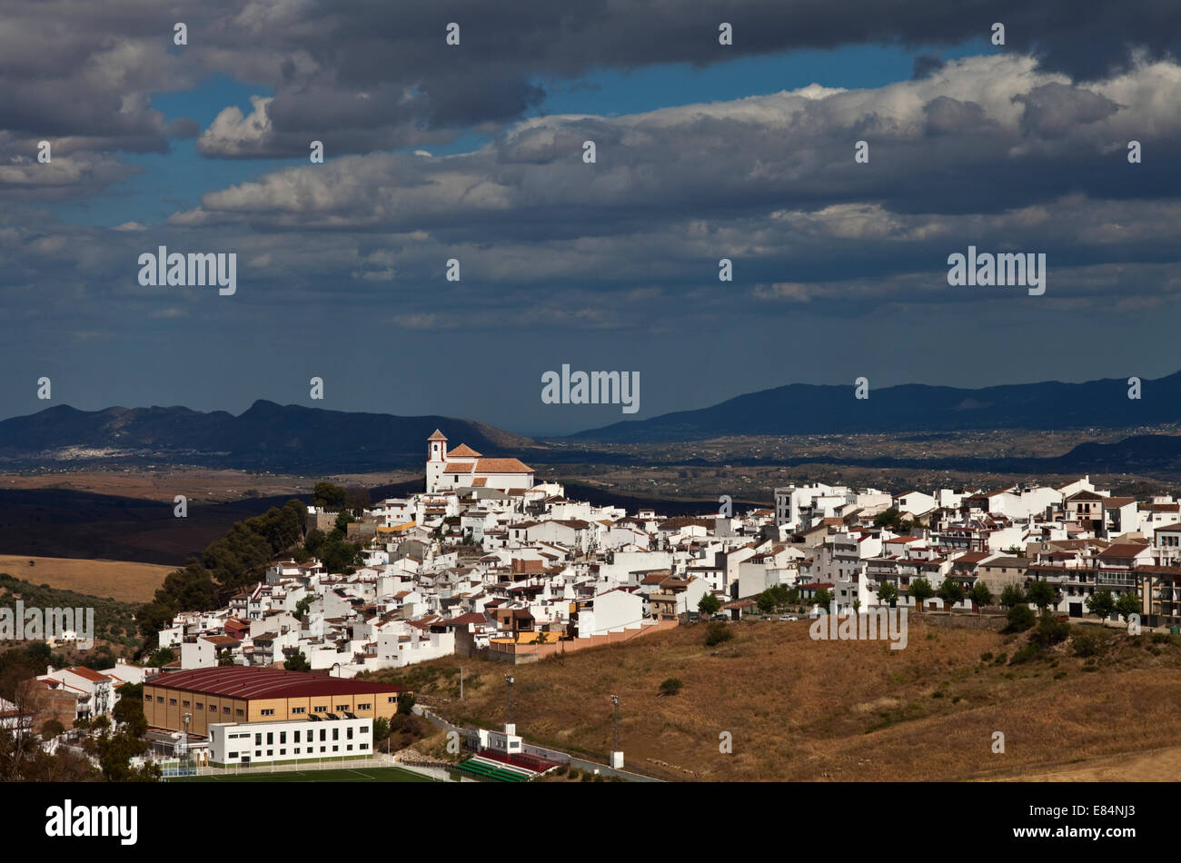 View of the hill top village of Alozaina from the north, Malaga province, Spain Stock Photo