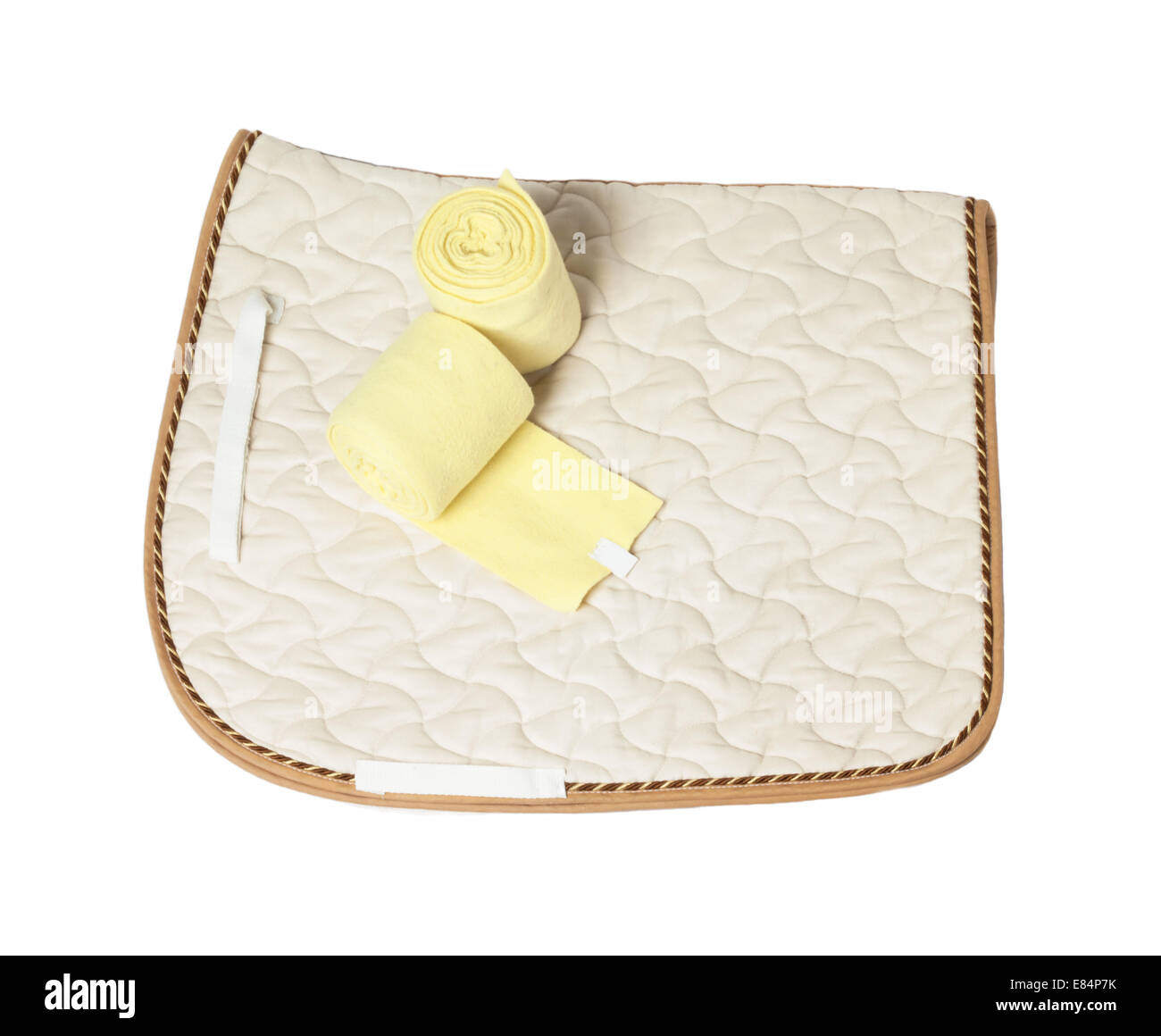 dressage champagne saddle cloth and yellow bandages  isolated on white Stock Photo