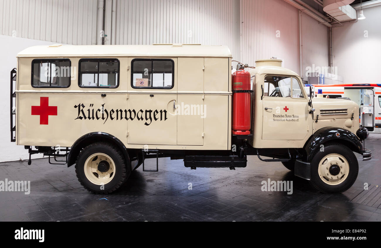 Historic Red Cross Kitchen Truck at the 65th IAA Commercial Vehicles Fair 2014 in Hannover, Germany Stock Photo
