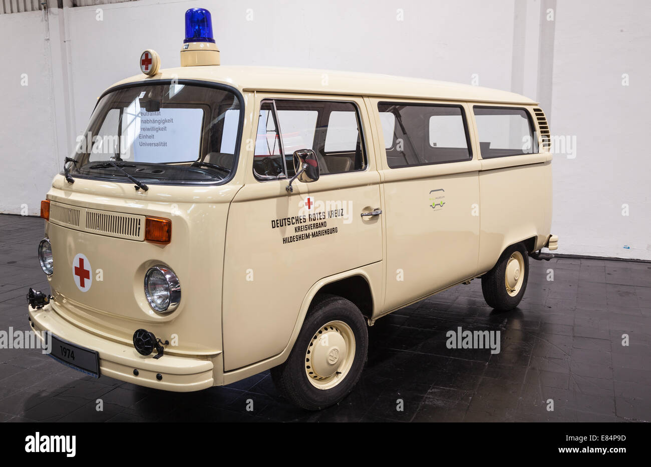 Historic Volkswagen T2 van Red Cross Service from 1974 at the 65th IAA Commercial Vehicles Fair 2014 in Hannover, Germany Stock Photo