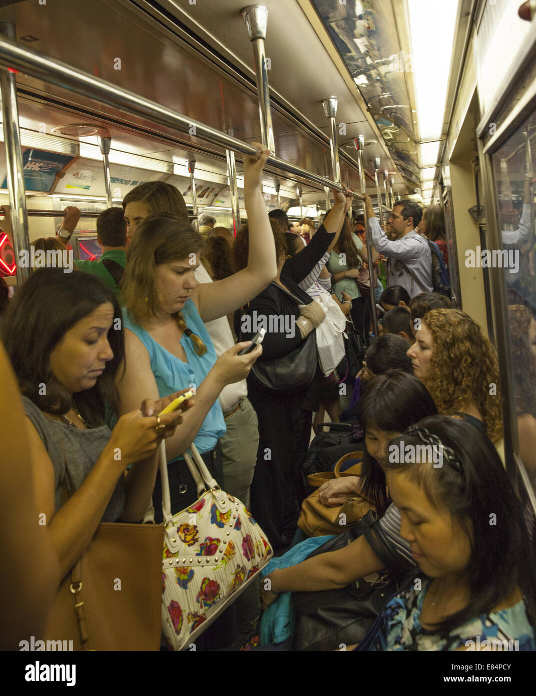 Crowded subway car at the evening rush hour in New York City Stock ...