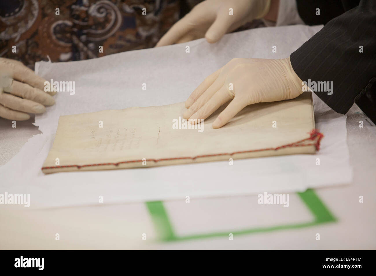 Employees of the Musee de la Civilisation de Quebec Museum unbox the Traite de Paris de 1763 (Treaty of Paris of 1763) before an Stock Photo