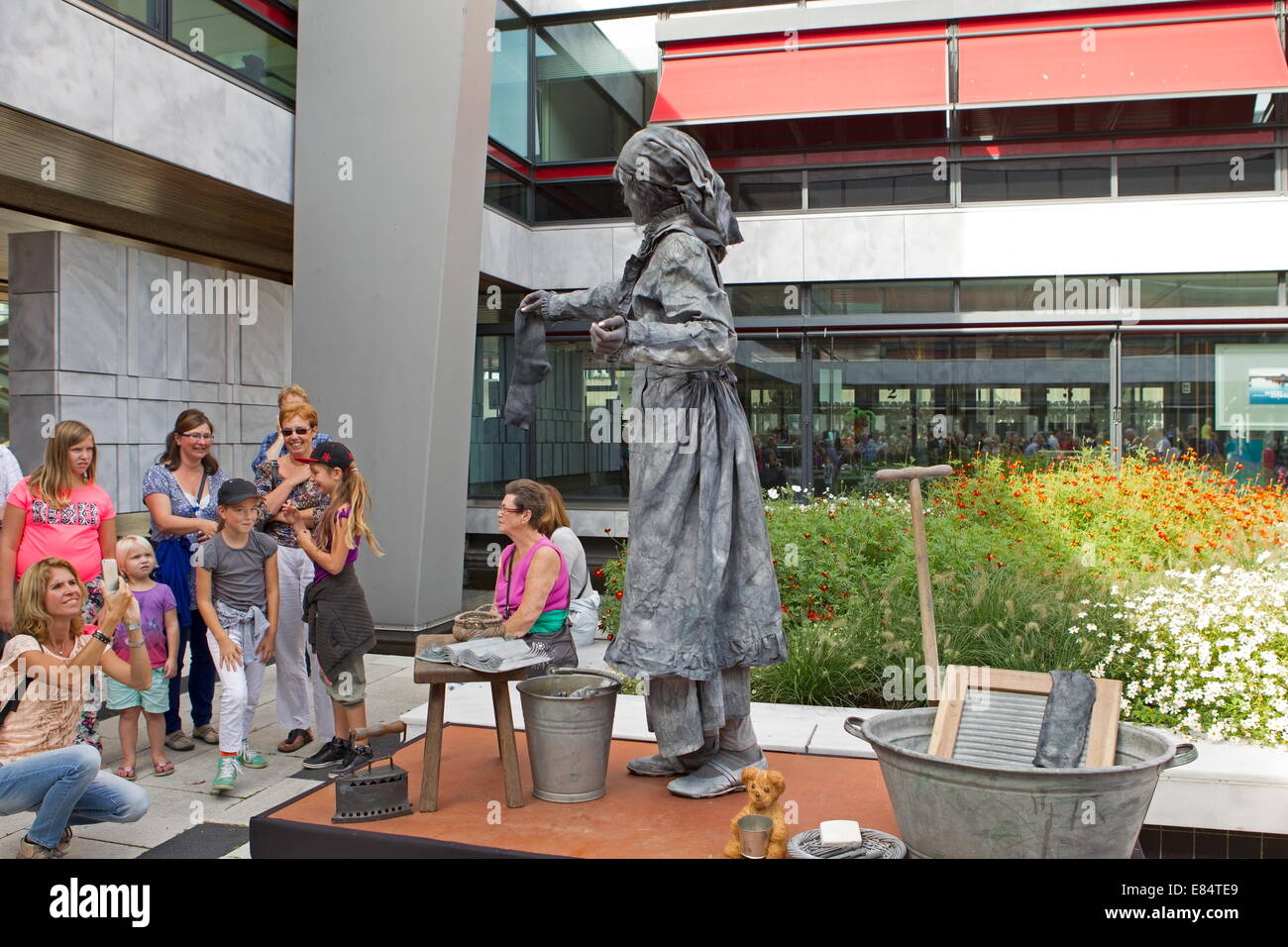 Arnhem, Netherlands - September 28, 2014: Artist imagines laundress during world championships living statues in Arnhem Stock Photo