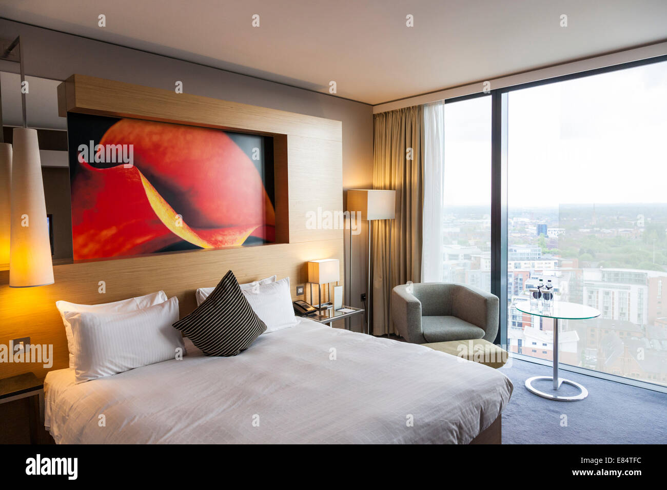 Hotel room interior at the Hilton Deansgate Hotel in Manchester, England, UK Stock Photo