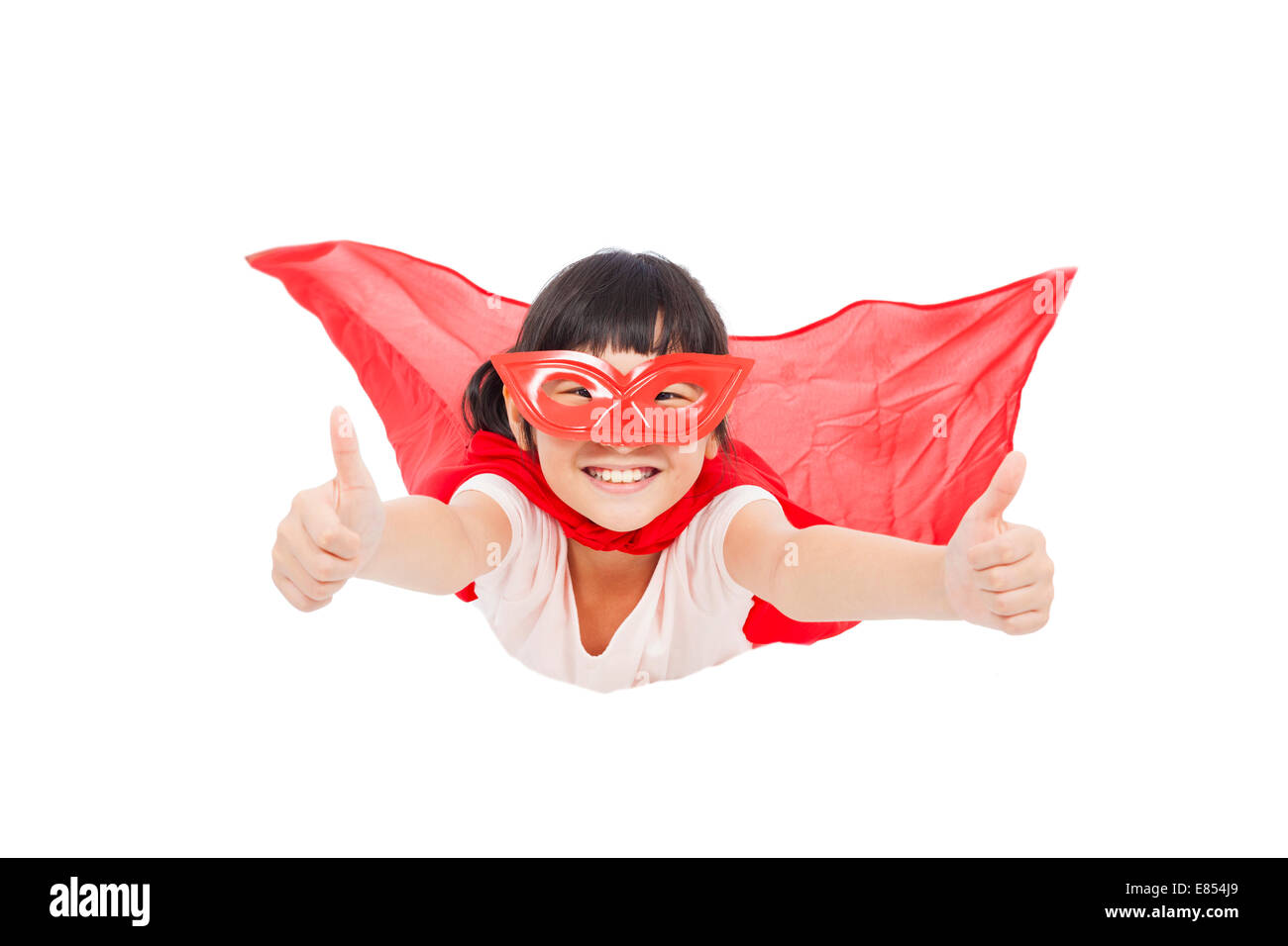 superhero kid flying and thumb up. isolated on white background Stock Photo