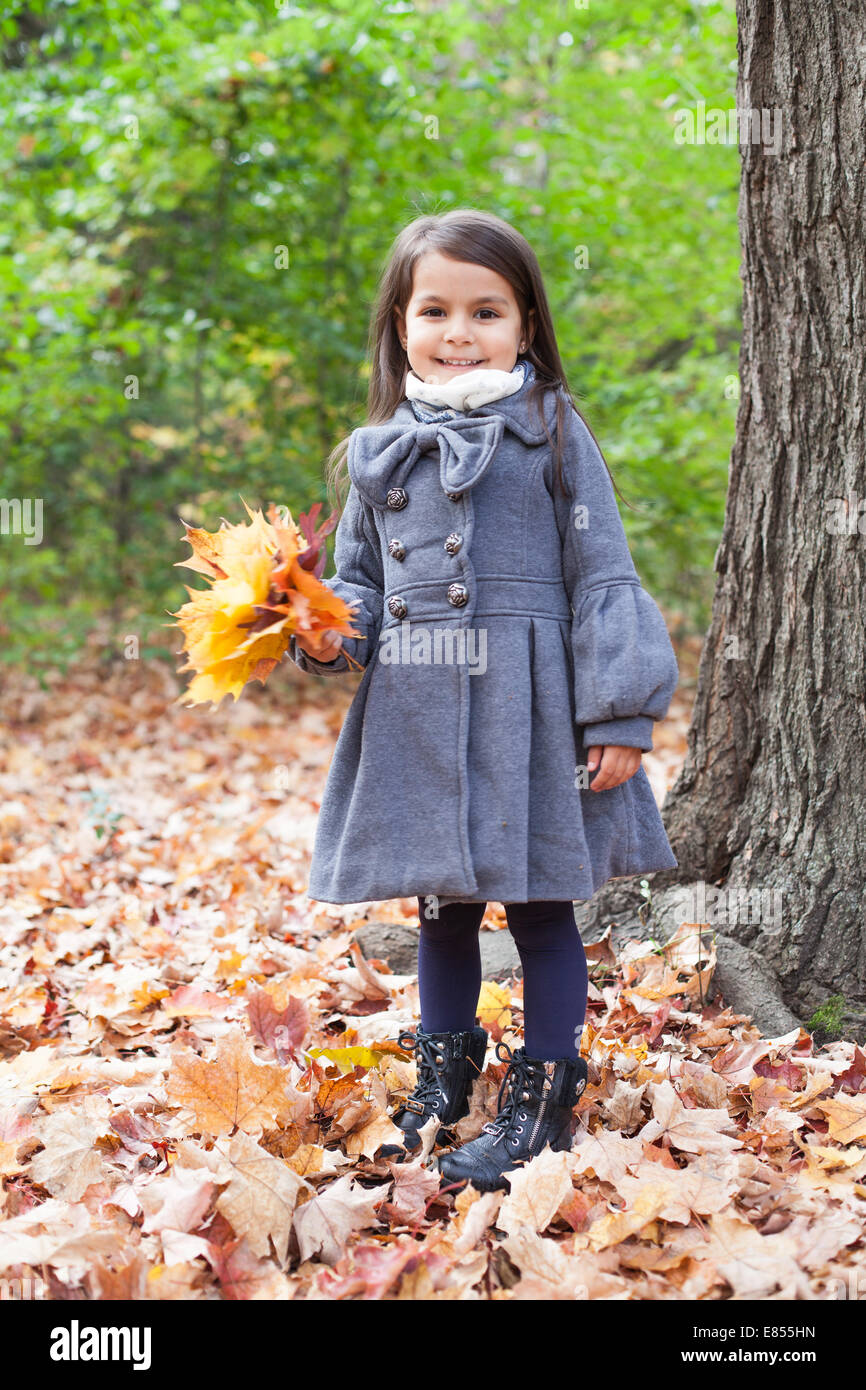 little girl in autumn park Stock Photo - Alamy