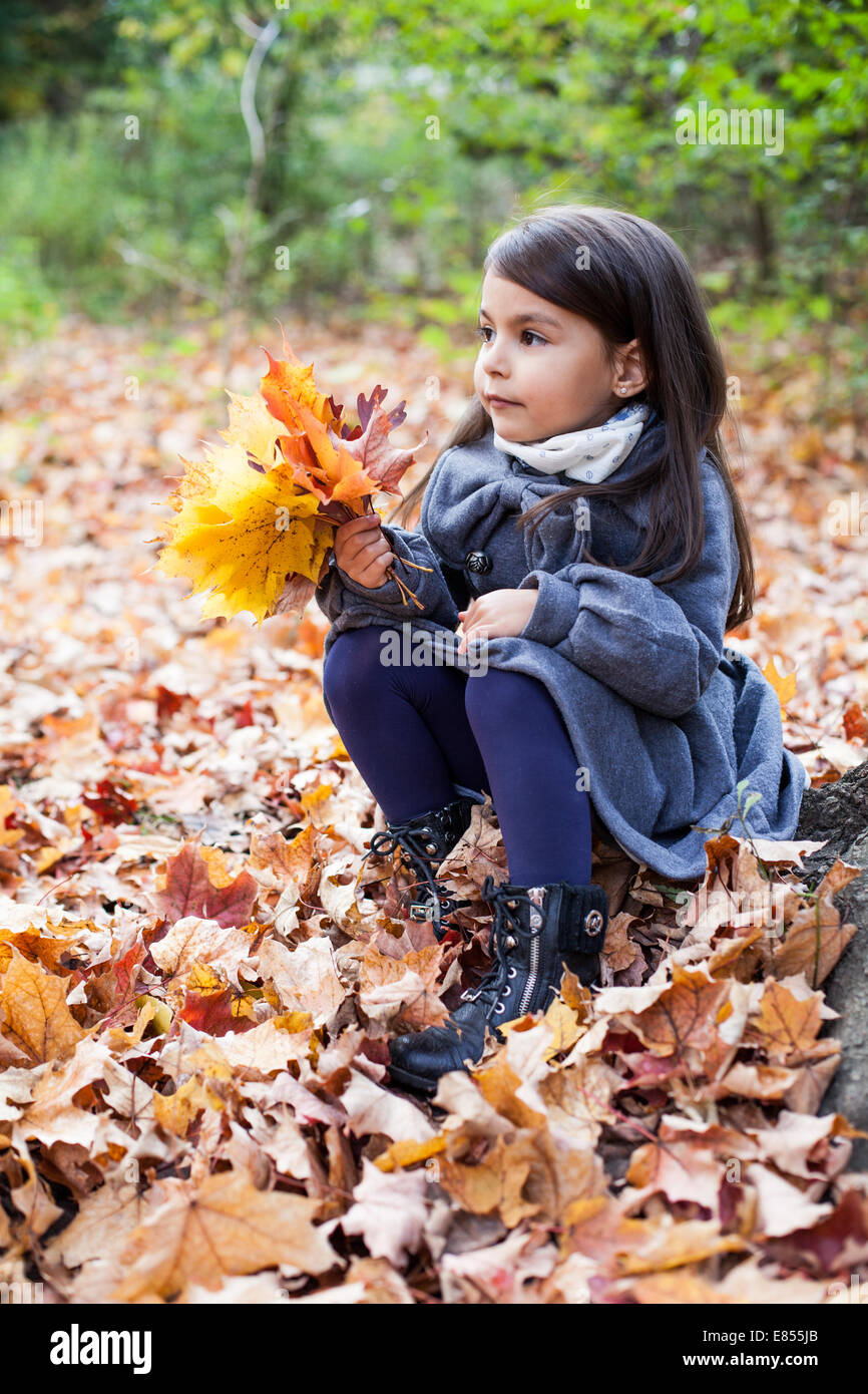 little girl in autumn park Stock Photo - Alamy