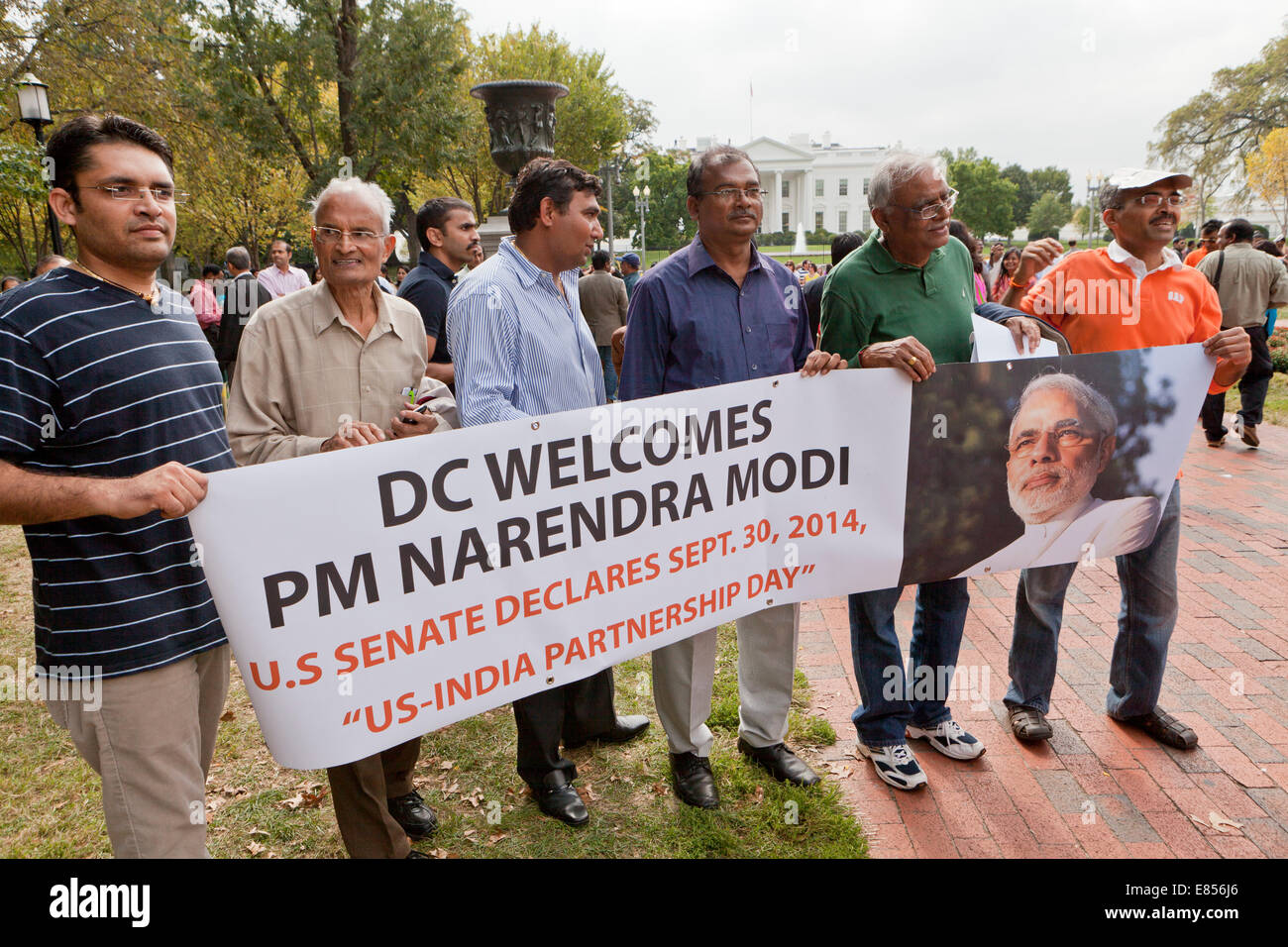 October 3, 2014, Washington, DC USA: Indian nationals in Washington hold welcome sign for Prime Minister Narendra Modi Stock Photo
