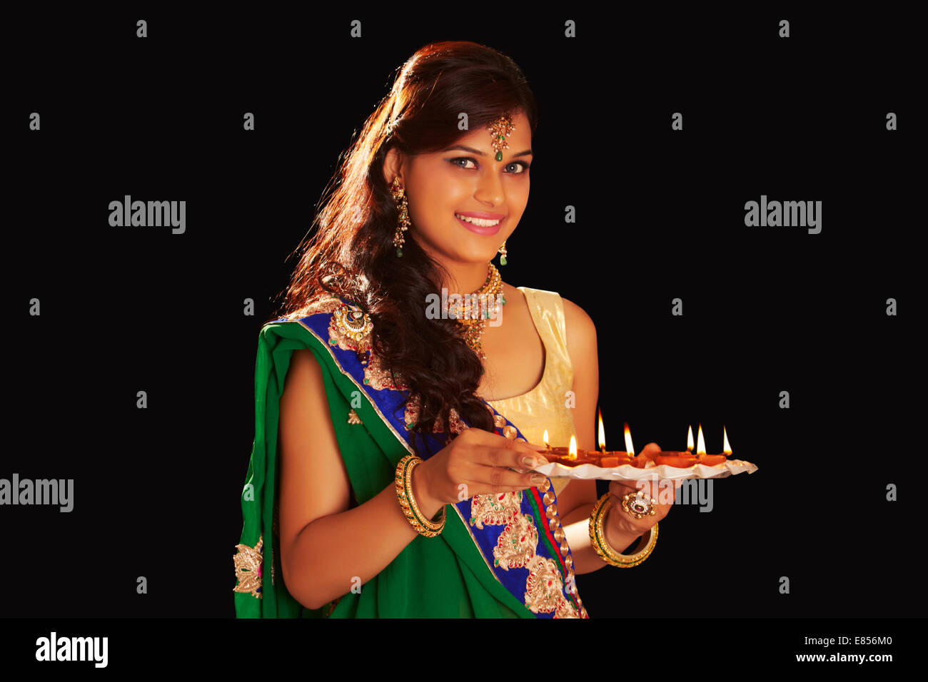 indian ladies diwali Festival diya thali Stock Photo Alamy