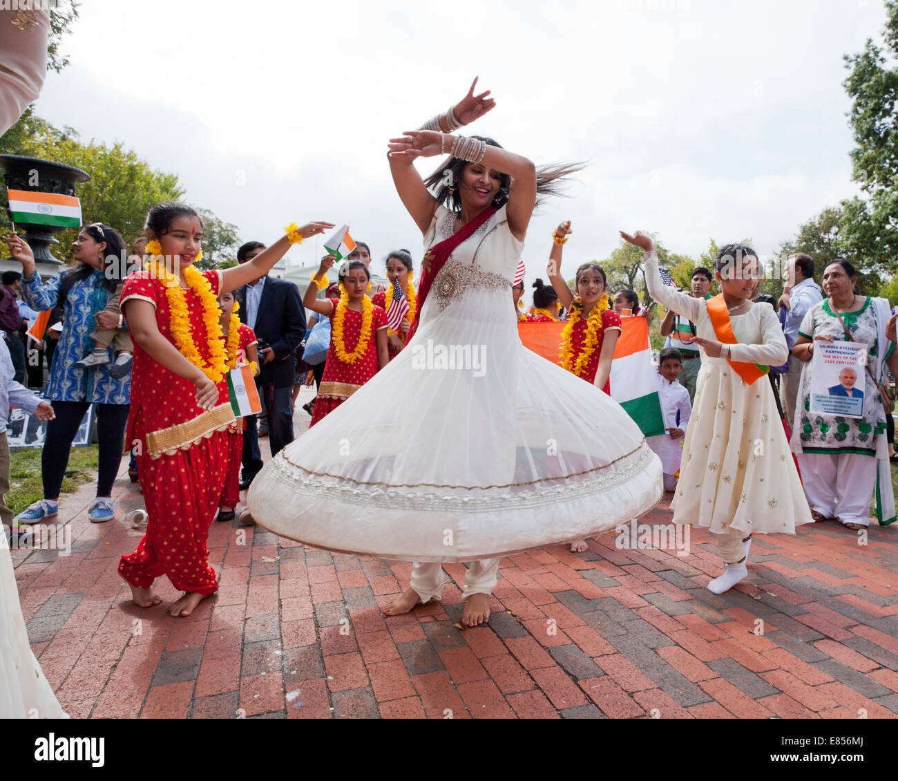 Indian woman and girls performing Bhangra, a Punjabi folk dance Stock