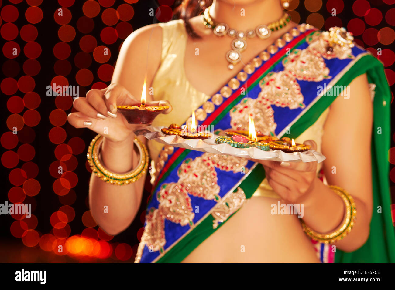 indian ladies diwali Festival diya thali Stock Photo Alamy
