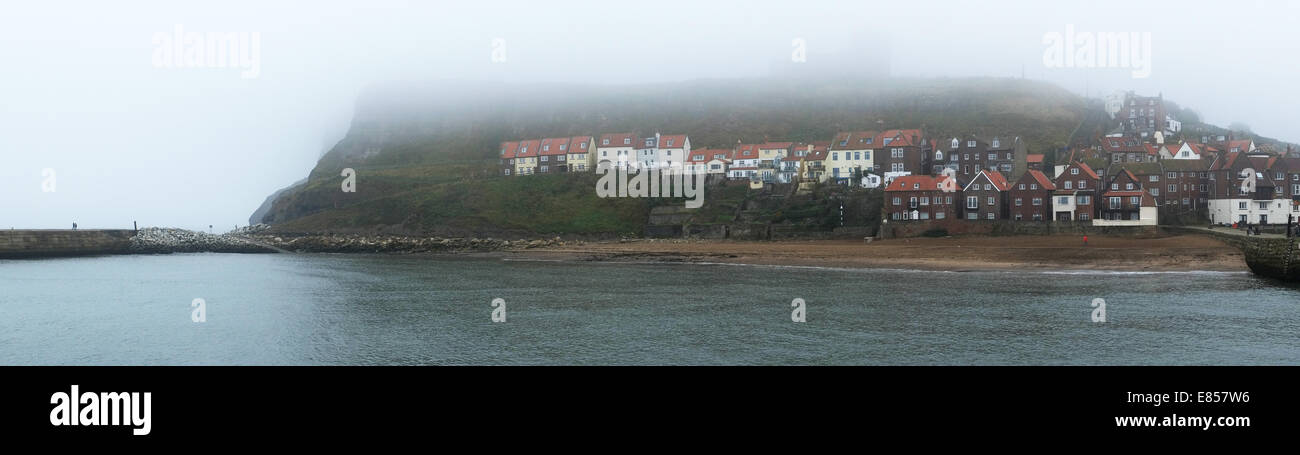Panoramic shot of Whitby with mist and sea fret. Stock Photo