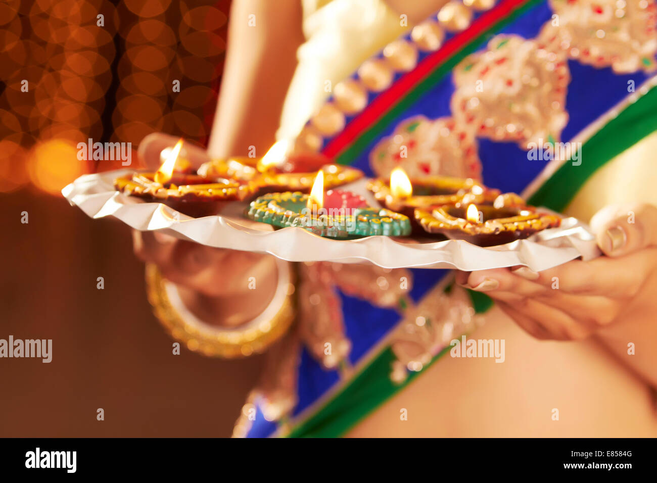 indian ladies diwali Festival diya thali Stock Photo Alamy