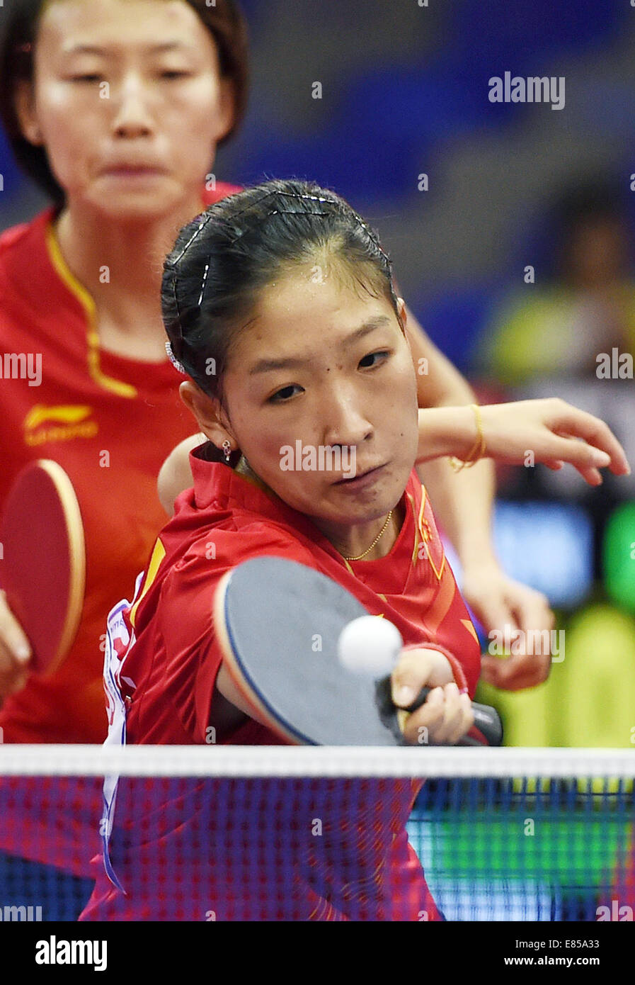 Incheon, South Korea. 1st Oct, 2014. Liu Shiwen (front) and Wu Yang of ...