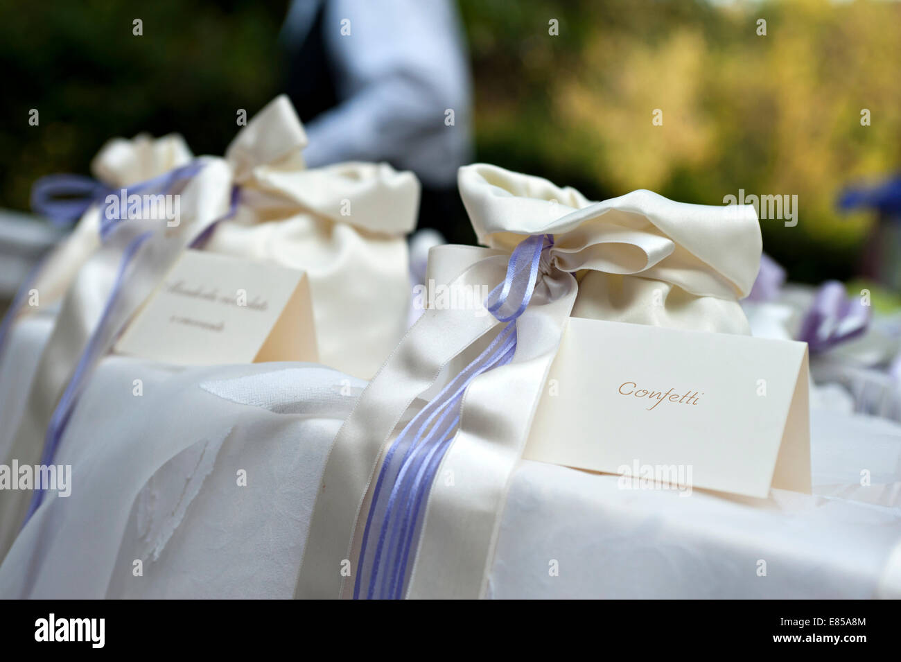 wedding table with bags of confetti Stock Photo Alamy