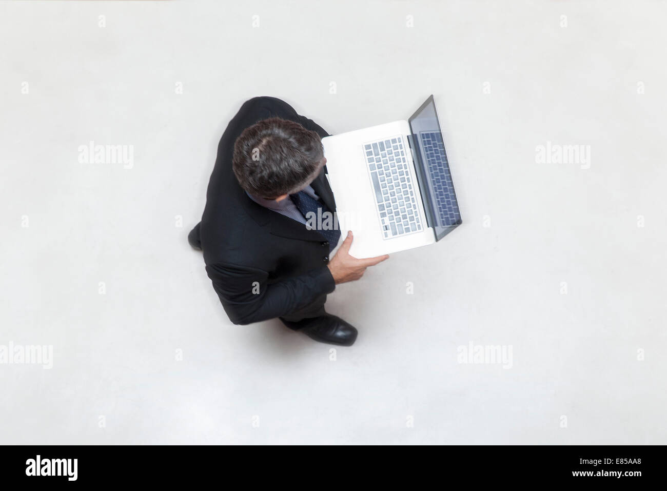 Businessman executives using computers hi-res stock photography and ...