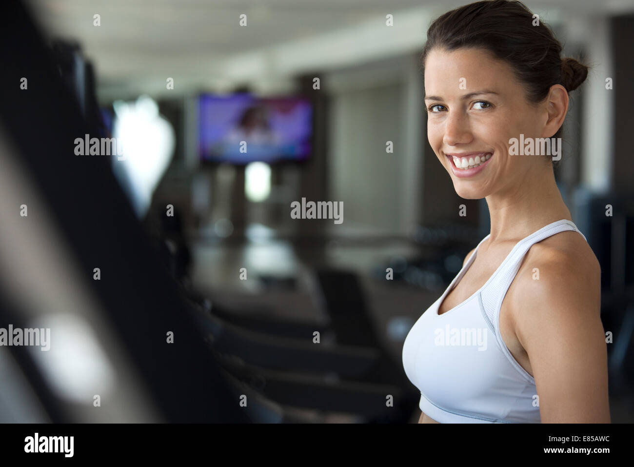 Woman exercising in health club, portrait Stock Photo
