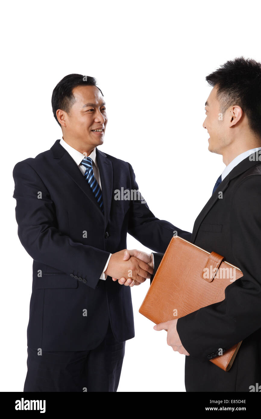 Premium Photo  Two happy businessmen shake hands over resume