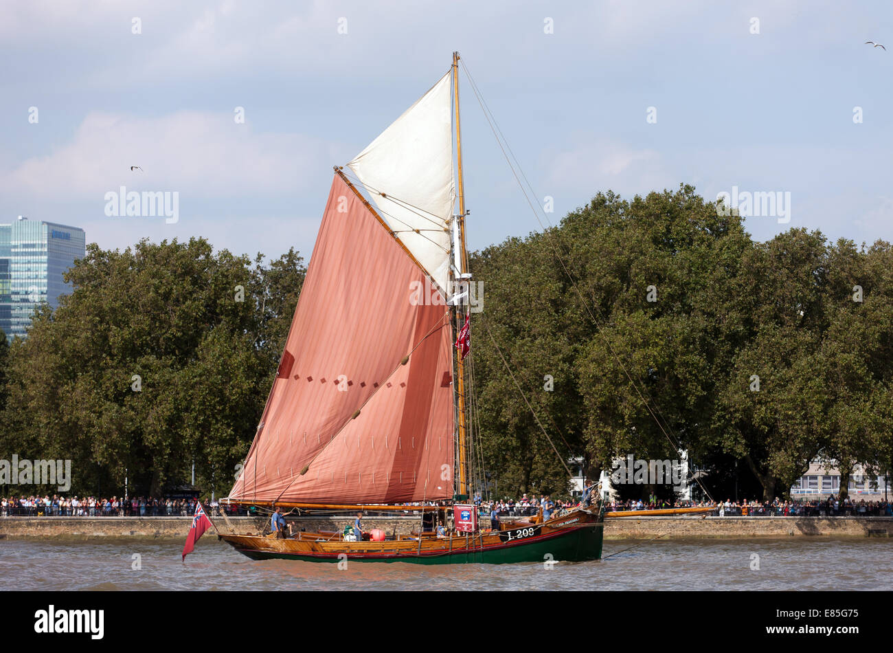 Eda Frandsen, a 65 foot  wooden sailing yacht, taking part in the parade of Sale, during the Tall Ships Festival, Greenwich. Stock Photo