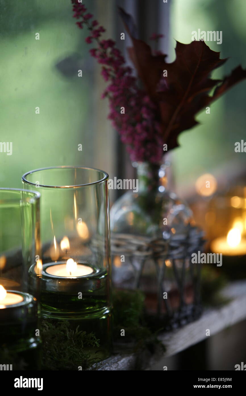 Candles on a window sill Stock Photo Alamy