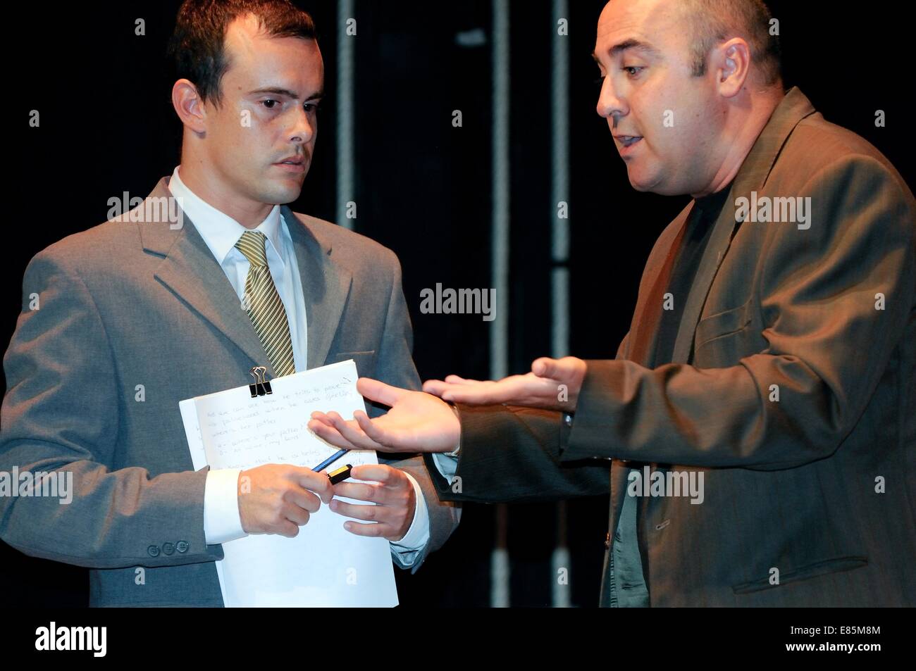 Men acting on stage Stock Photo - Alamy