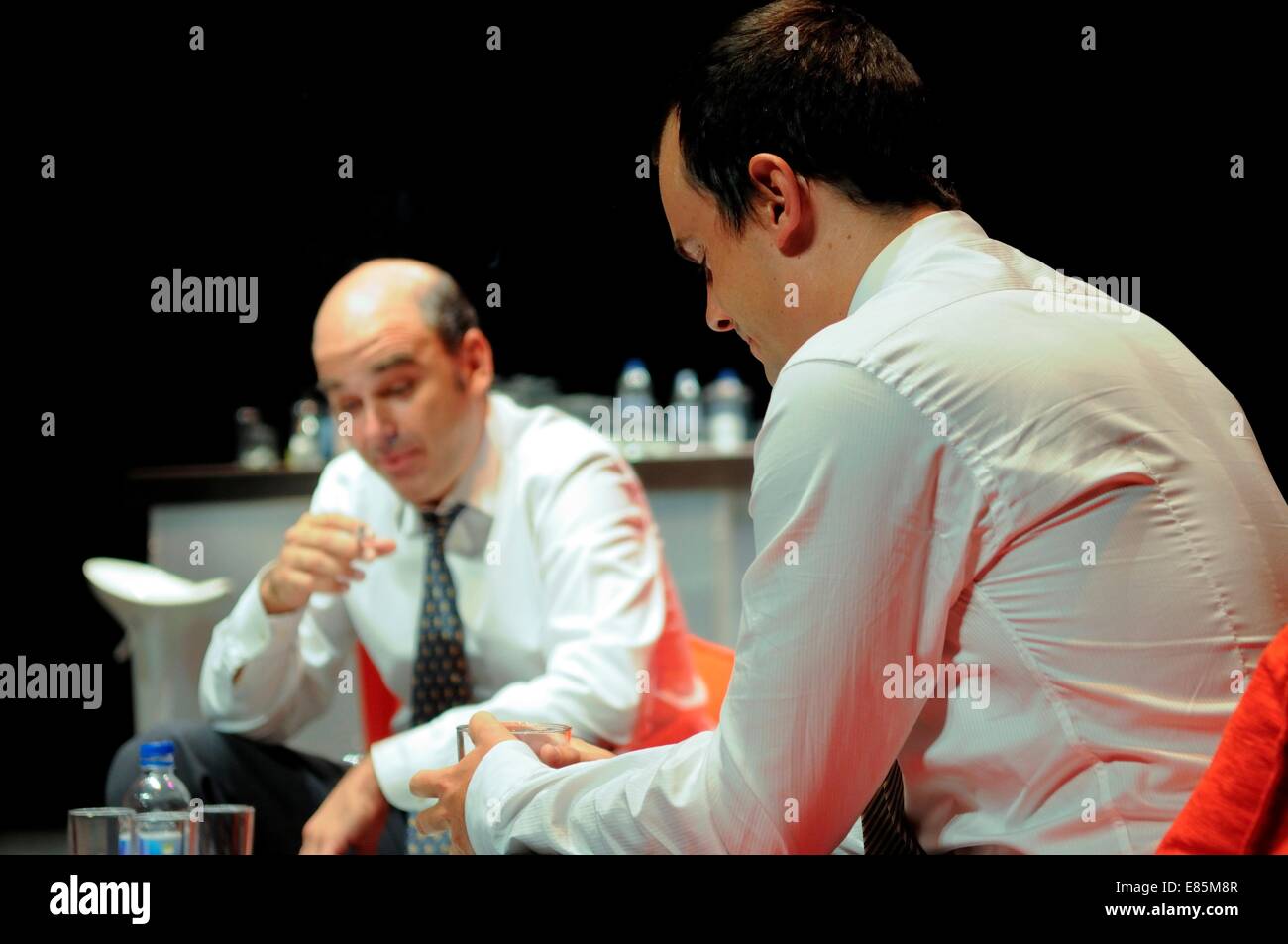 Men acting on stage Stock Photo - Alamy