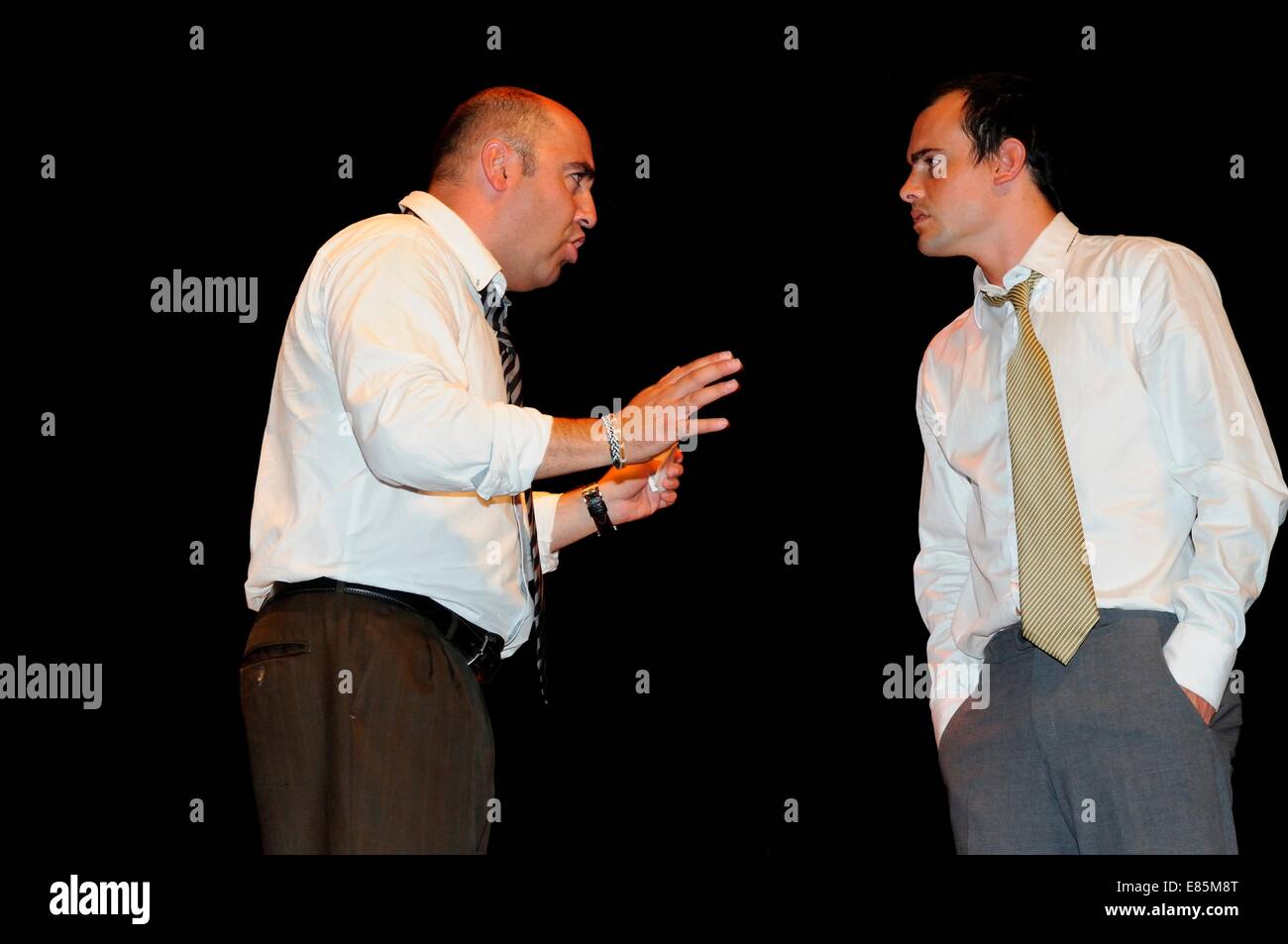 Men acting on stage Stock Photo - Alamy