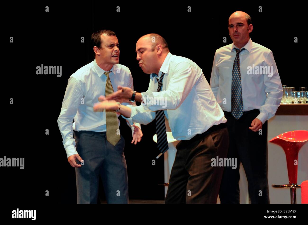 Men acting on stage Stock Photo - Alamy