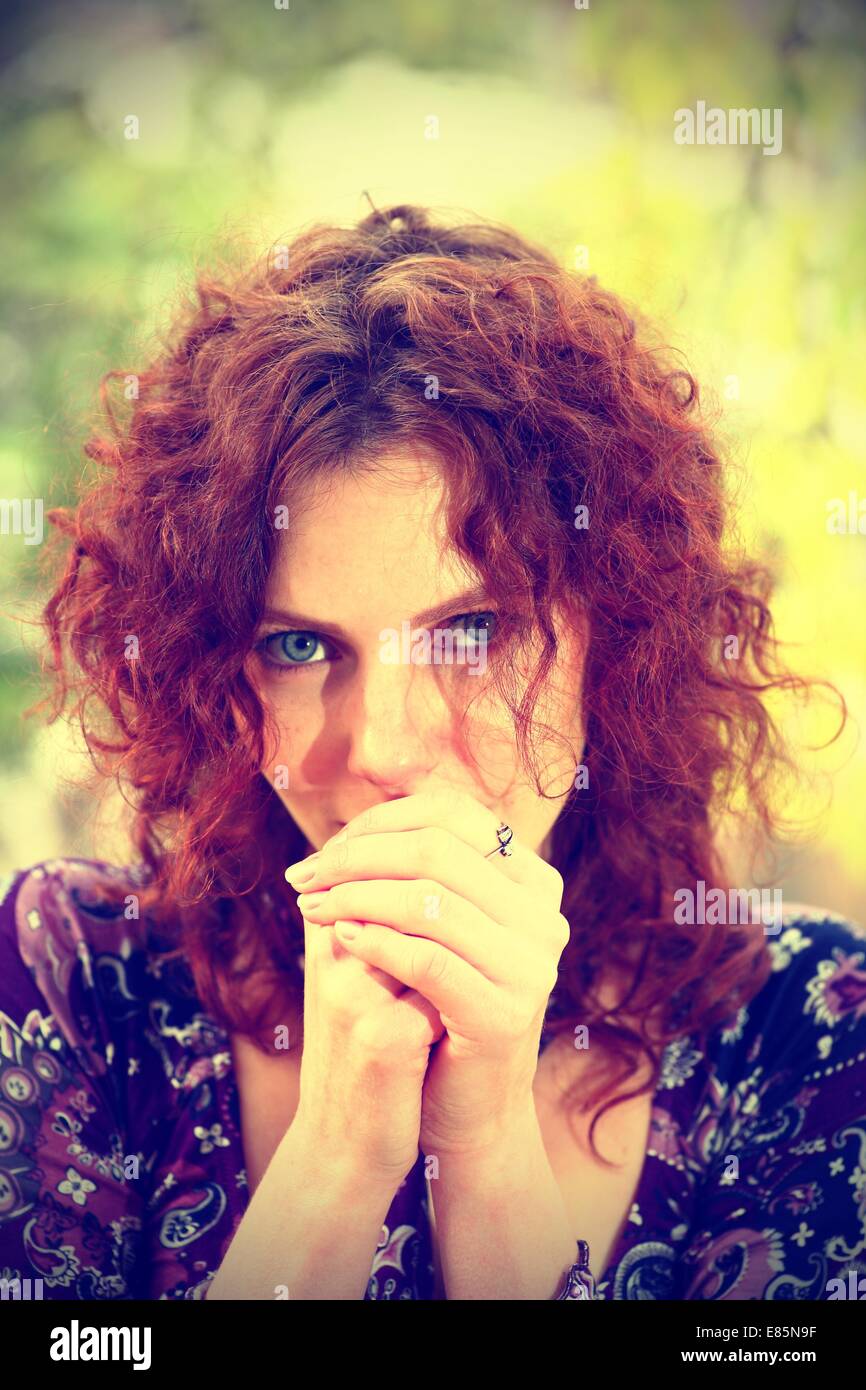 Portrait of a redheaded girl near a tree (split toning Stock Photo - Alamy