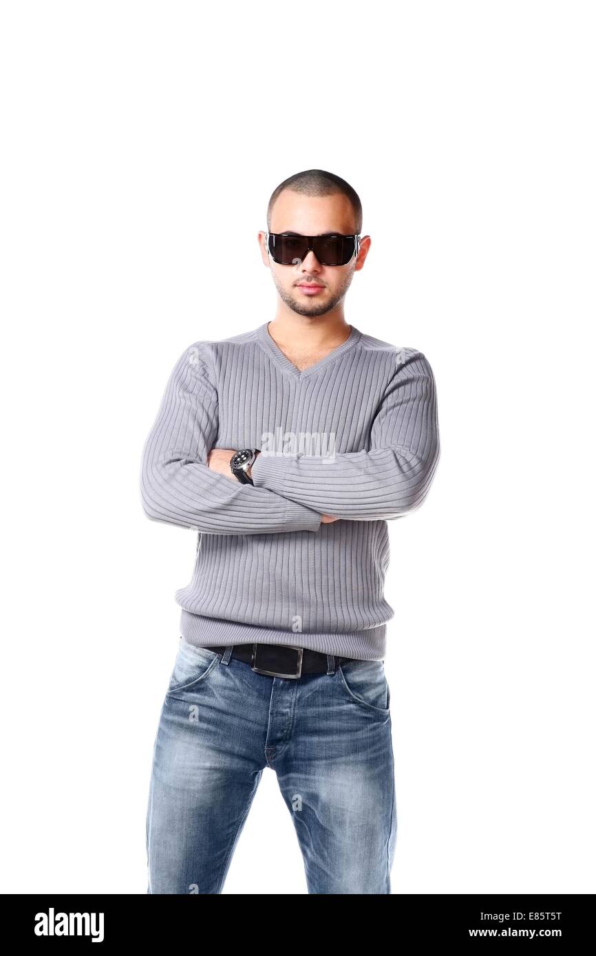 Casual friendly man in jeans and pullover - isolated over a white background Stock Photo