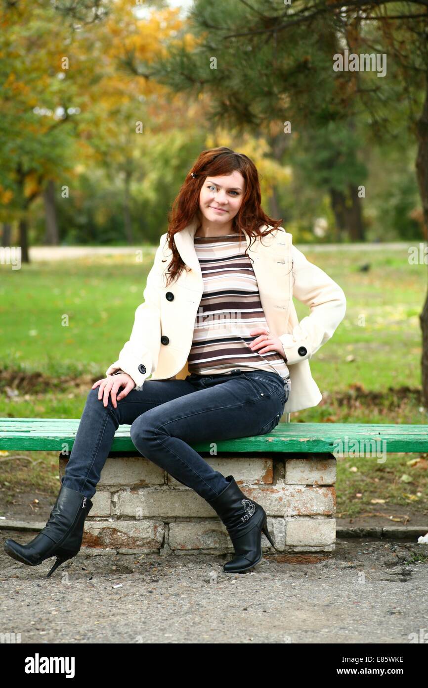 Portrait of a redheaded girl near a tree (autumn colors Stock Photo - Alamy