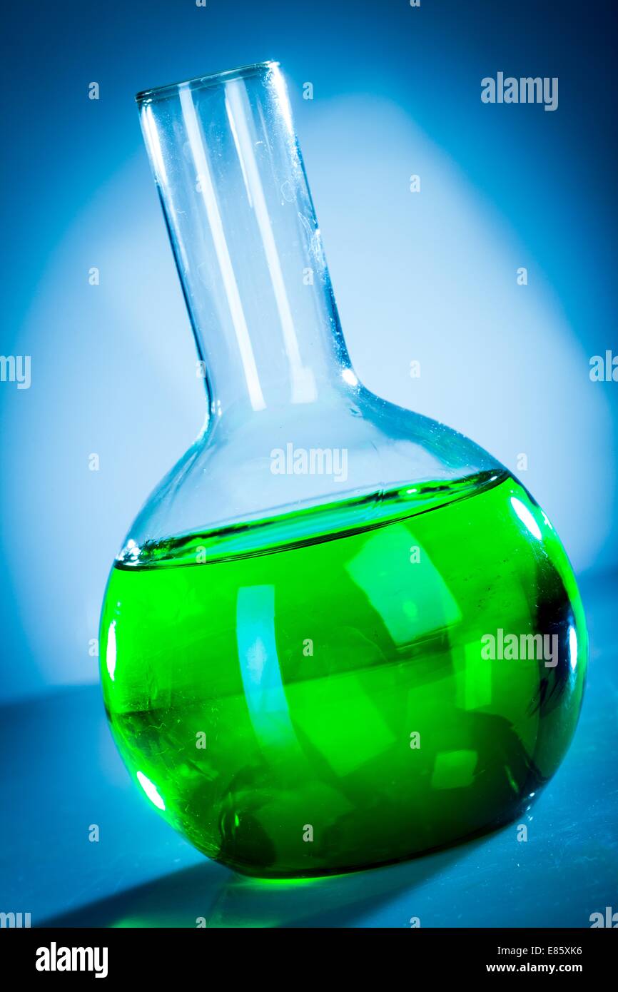 Test tubes on blue background Stock Photo - Alamy