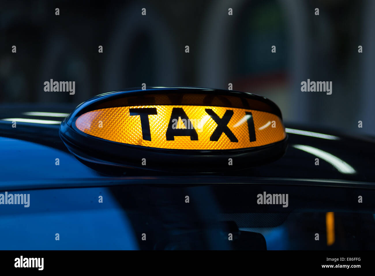 Closeup to a London Taxi Sign Stock Photo