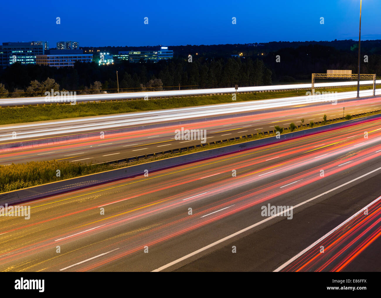Side view of a motorway at dusk with copy space Stock Photo