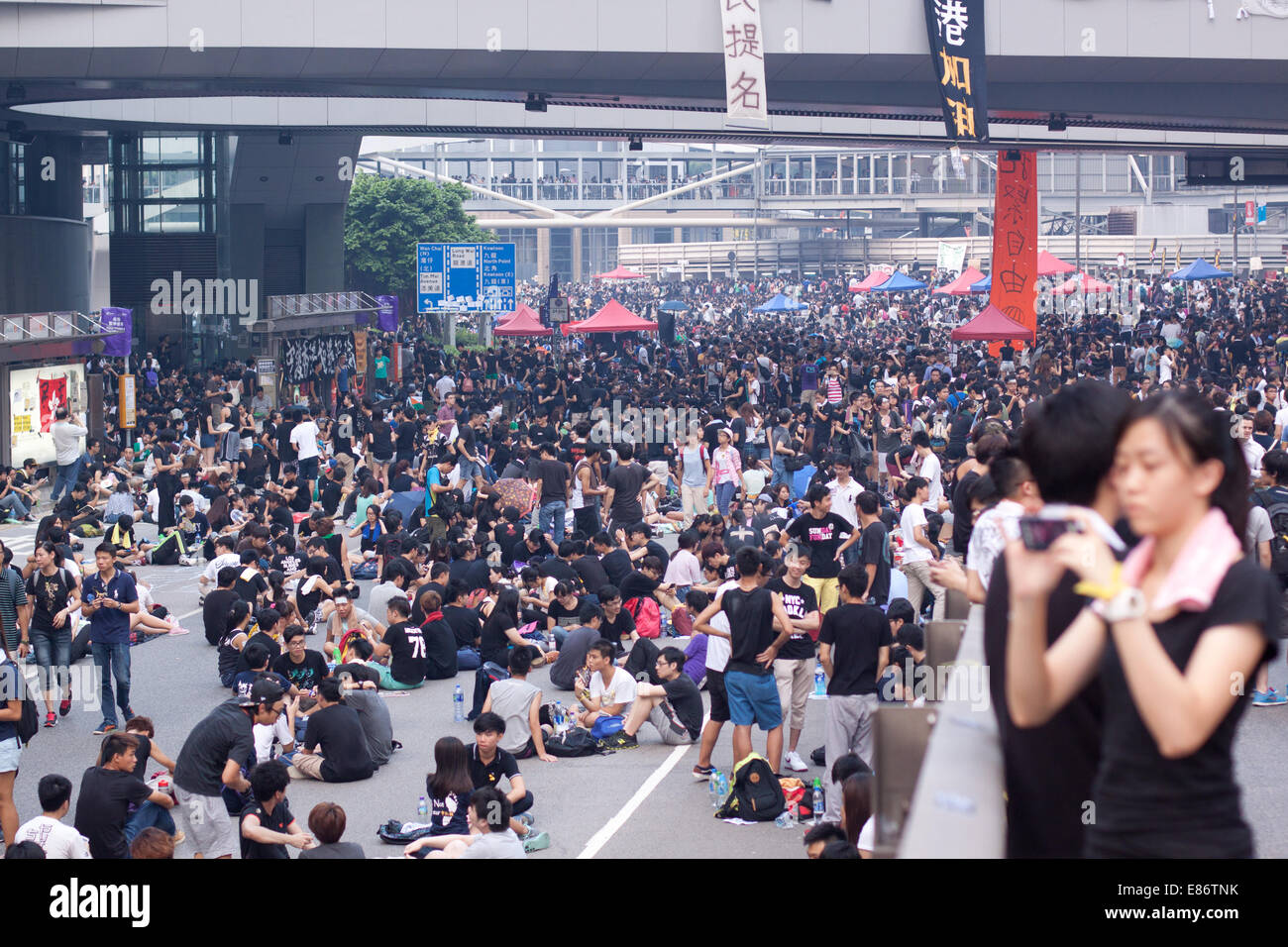 Hong Kong. 30th September, 2014. Crowds on the roads in Admiralty district.  Protests against decision by Beijing to offer Hong Kong voters, choice of candidates for Chief Executive in 2017 elections from approved list of candidates, rather than an open list. Credit:  SCWLee/Alamy Live News Stock Photo