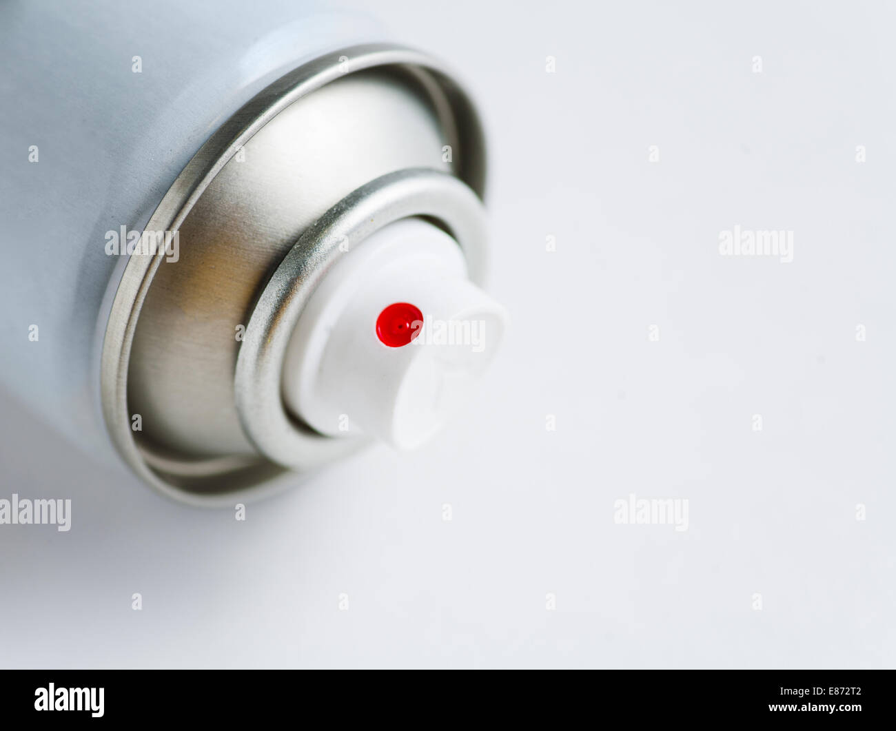 Aerosol can on white closeup image Stock Photo - Alamy