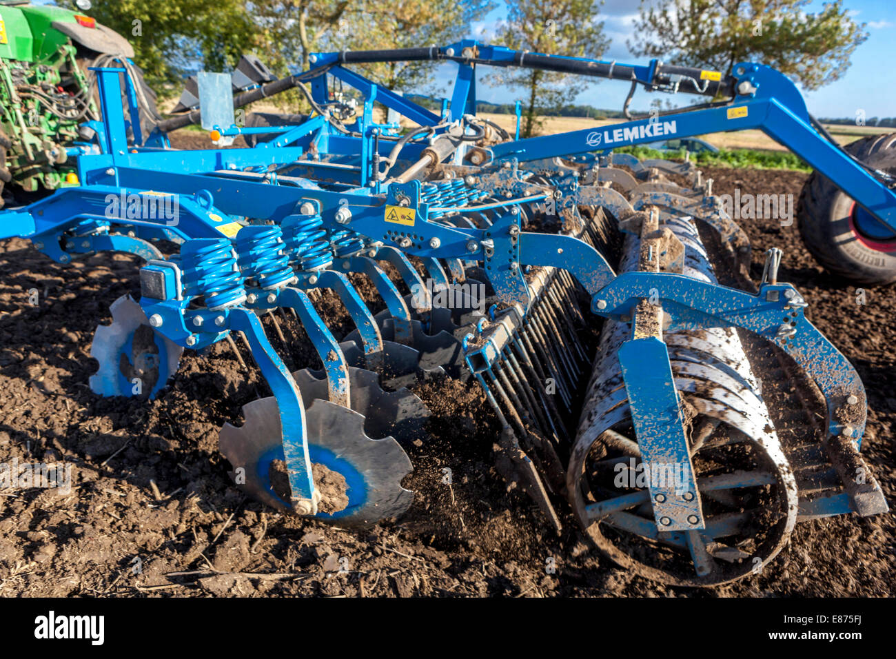 Plough Plowing machine blades plowing field Stock Photo